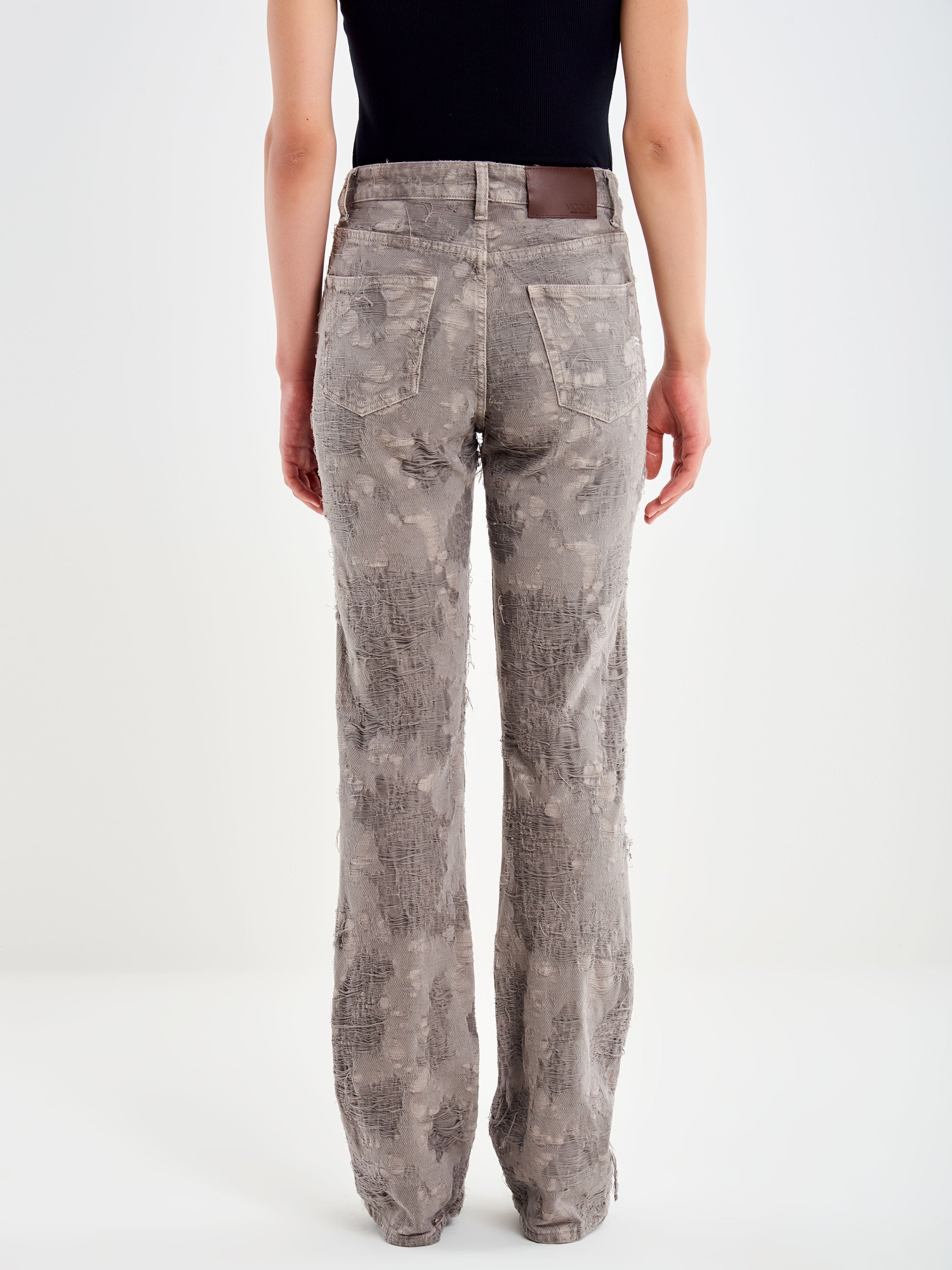 Jeans Effetto Sfilacciato